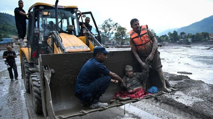 Nepal Begins Burials As Death Toll From Himalayan Flood Disaster Nears 800